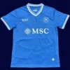 Napoli Home Jersey 25/26 Fans Version front with classic sky-blue design and crest.
