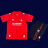 Osasuna Home Jersey Kids kits 2526A - KFCool – Football Jerseys & Soccer Kits Store Osasuna Home Kids Kits 25/26 front view with mini crest and youth fit.