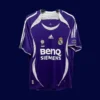 front view of purple away retro football jersey (06/07) with tailored fit and vintage accents.
