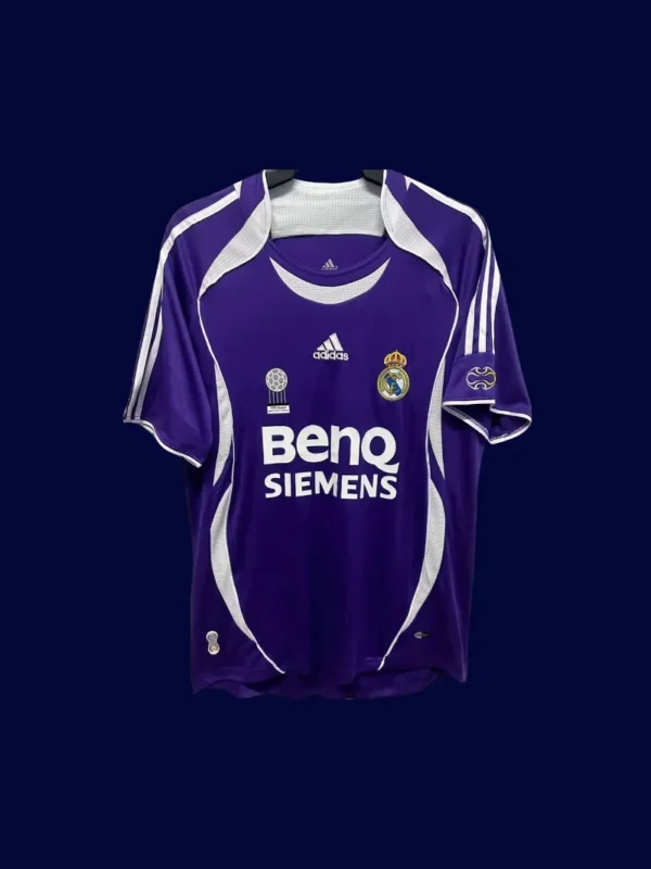 front view of purple away retro football jersey (06/07) with tailored fit and vintage accents.