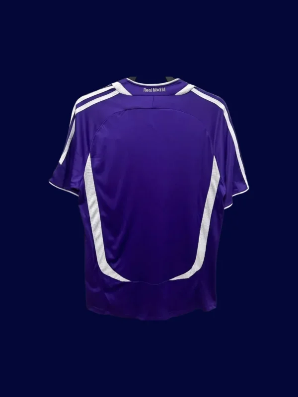back view of purple away retro football jersey (06/07) showing reinforced number panel and simple seams.