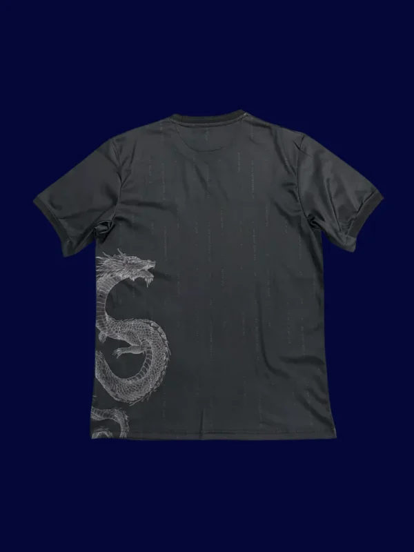 back view of black dragon modern jersey (24/25) showing patterned back and number-ready panel.
