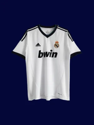 front view of white home retro football jersey (12/13) with traditional collar and subtle piping.