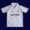 Real Madrid Home White Retro Jersey 8789A - KFCool – Football Jerseys & Soccer Kits Store front view of white retro football jersey (87/89) with retro piping and classic stripes.