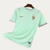 France Away Jersey 2627 Fans Version01 - KFCool – Football Jerseys & Soccer Kits Store Mint green France national team soccer jersey on a hanger, featuring the FFF crest and Nike swoosh.