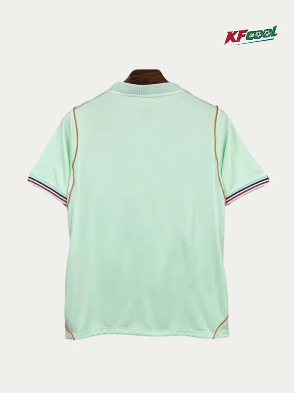 France Away Jersey 2627 Fans Version02 - KFCool – Football Jerseys & Soccer Kits Store Back view of a mint green short-sleeve soccer jersey with striped cuff edges and gold piping along the side seams; small collar and faint brand mark on the upper back.