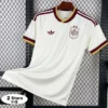 3a6f7ae579316710 - KFCool – Football Jerseys & Soccer Kits Store White Spain national team soccer jersey on a hanger, features maroon and gold trim, crest on the left chest and Adidas logo on the right, with two stars above the crest and a '2 Stars' badge in the corner.