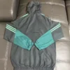 Algeria 2026/27 Grey Windbreaker - Back View - KFCool – Football Jerseys & Soccer Kits Store Algeria 2026/27 Grey Windbreaker - Back View | KFCOOL