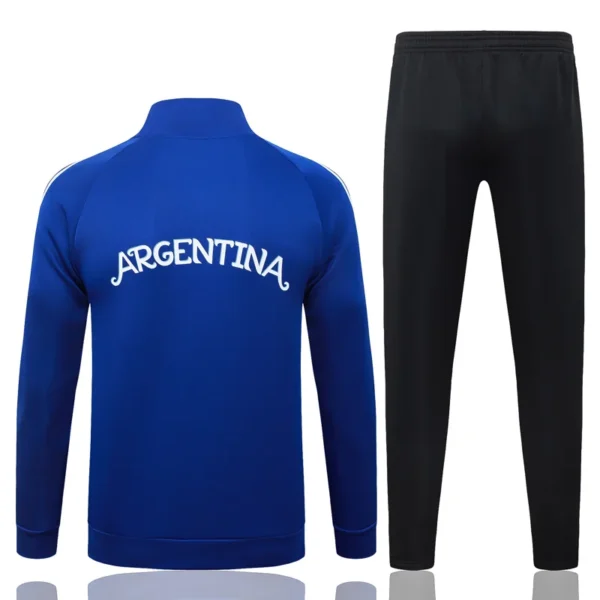 Argentina 2026/27 Blue Kids Jacket Tracksuit - Back View - KFCool – Football Jerseys & Soccer Kits Store Blue Argentina track jacket with white 'ARGENTINA' lettering paired with black jogger pants image set for sportswear.