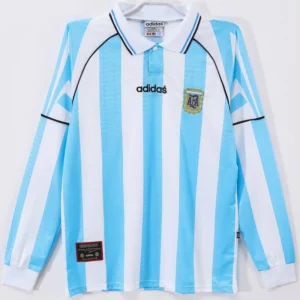 Argentina 1996/97 Retro Home Long Sleeve Jersey Fan Version - Front View Argentina national team Adidas football jersey with blue and white vertical stripes and crest on the chest; collared shirt on a plain background.
