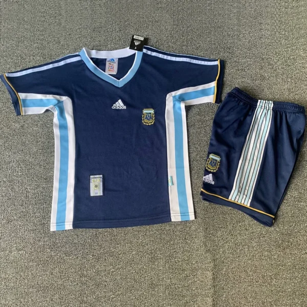 Argentina 1998/99 Retro Away Kids Kit Fan Version - Front View - KFCool – Football Jerseys & Soccer Kits Store Argentina 1998/99 Retro Away Kids Kit Fan Version - Front View | KFCOOL
