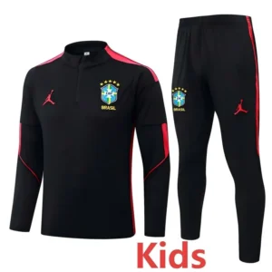 Brazil 2026/27 Black Kids Half Pull Tracksuit - Front View Kids' Brazil soccer tracksuit: black with pink accents, crest on chest and pants, Jordan logo, labeled 'Kids'
