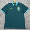Brazil national football team polo shirt in teal with light-blue collar and cuffs, Nike swoosh and CBF Brasil crest with stars.
