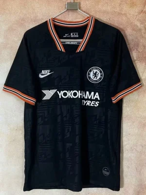 Chelsea 2019/20 Third Jersey Fan Version - Front View Chelsea FC jersey (black) with Yokohama Tyres sponsor hanging on a hanger, showing crest and Nike logo.
