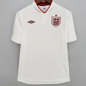 England 2012/13 Retro Home Jersey Fan Version - Front View White England national team polo shirt with red-trim collar, crest on left chest and Umbro logo on the right side.