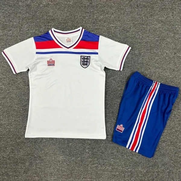 England 1982/83 Retro Home Kids Kit Fan Version - Front View - KFCool – Football Jerseys & Soccer Kits Store England 1982/83 Retro Home Kids Kit Fan Version - Front View | KFCOOL