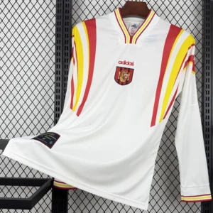 White Adidas Spain football jersey on hanger with red and yellow stripes and crest emblem on chest