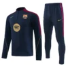 Barcelona 2026/27 Blue Half Pull Tracksuit - Front View - KFCool – Football Jerseys & Soccer Kits Store Barcelona FC navy training tracksuit with maroon stripes, gold Nike swoosh, and Spotify sponsor logo on the chest (top and matching pants)