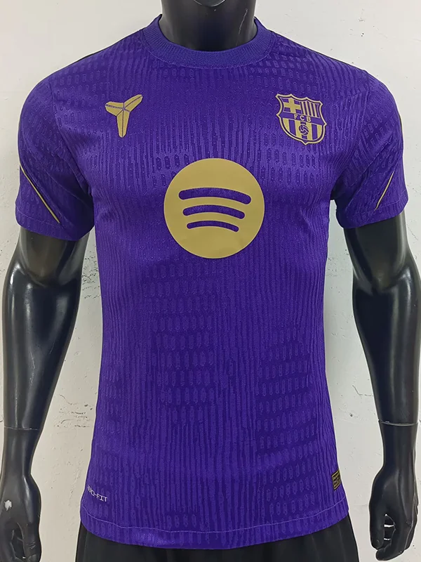 Barcelona 2026/27 Training Shirt Player Version - Front View Front view of a purple FC Barcelona jersey on a mannequin, featuring a gold Spotify logo across the chest and the club crest on the left.