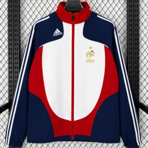Adidas France national team jacket with red, white, and blue panels and FFF crest on the chest.
