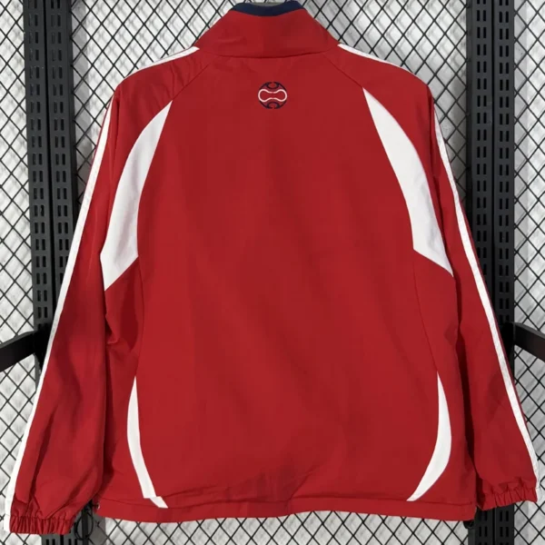 Back view of a red athletic jacket with white side panels and sleeve accents; small circular logo near the collar on the upper back.