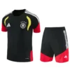 Germany national team soccer jersey and shorts set: black with red sleeves, yellow accents, and white crest on chest.