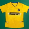Inter Milan 2002/03 Retro Away Jersey Fan Version - Front View Yellow Inter Milan soccer jersey with blue trim, Nike logo, club crest, and Pirelli sponsor across the chest