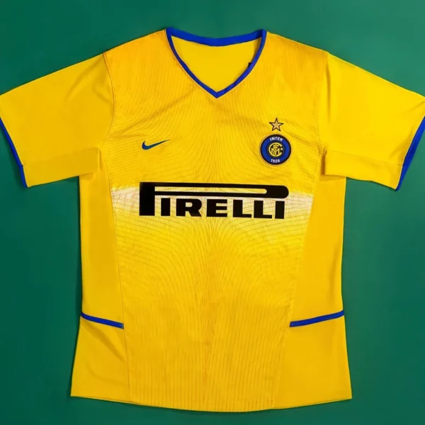 Inter Milan 2002/03 Retro Away Jersey Fan Version - Front View Yellow Inter Milan soccer jersey with blue trim, Nike logo, club crest, and Pirelli sponsor across the chest