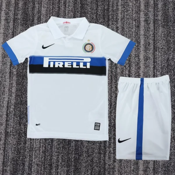 Inter Milan 2009/10 Retro Away Kids Kit Fan Version - Front View - KFCool – Football Jerseys & Soccer Kits Store Inter Milan white away kit: white jersey with blue-black Pirelli band and club crest, shorts with blue stripe and Nike swoosh on left leg