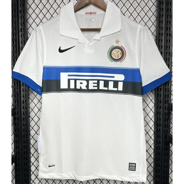 White Inter Milan soccer jersey on a hanger featuring a blue sponsor stripe, Nike logo, and club crest with a star above it