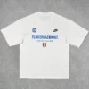 White T-shirt featuring Inter Milan logos: blue 'FC INTERNAZIONALE' text, 'Campioni d'Italia 25/26' line, Nike logo, Inter crest, and a small Italian flag shield.