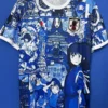 Japan 2025/26 Blue Special Edition Jersey Fan Version - Front View Blue anime-collage T-shirt on a hanger featuring multiple characters and a temple scene, with a Japan JFA patch on the chest.