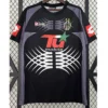 Juventus 2001/02 Retro Goalkeeper Jersey Fan Version - Front View Juventus football jersey on a hanger: black with purple sleeves, large white geometric chest design and T-Mobile sponsor.