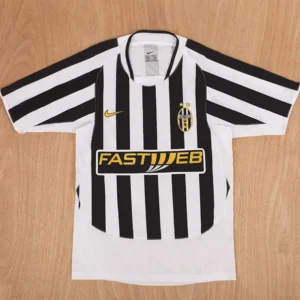 Juventus 2003/04 Retro Home Jersey Fan Version - Front View Juventus football jersey with black and white vertical stripes, sponsor logo FASTWEB, Nike crest, and team badge with two gold stars on the chest.
