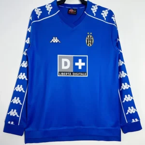 Blue Juventus long-sleeve football jersey with Kappa logos on sleeves and the D+ Libertà Digitale sponsor on the chest.