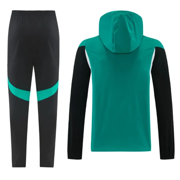 Two-piece athletic tracksuit: black pants with a teal curved stripe and a teal hooded jacket with black sleeves or panels.