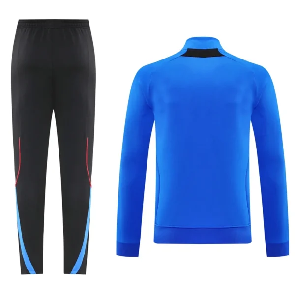 Manchester United 2025/26 Blue Jacket Tracksuit - Back View - KFCool – Football Jerseys & Soccer Kits Store Manchester United 2025/26 Blue Jacket Tracksuit - Back View | KFCOOL
