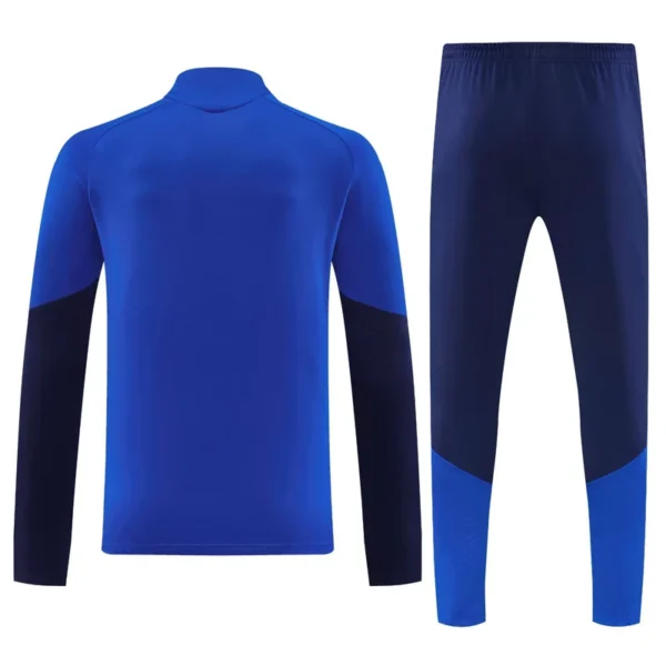 Manchester United 2026/27 Blue Half Pull Tracksuit - Back View - KFCool – Football Jerseys & Soccer Kits Store Manchester United 2026/27 Blue Half Pull Tracksuit - Back View | KFCOOL