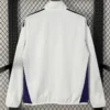 Manchester United 2026/27 White Blue Windbreaker - Back View - KFCool – Football Jerseys & Soccer Kits Store Manchester United 2026/27 White Blue Windbreaker - Back View | KFCOOL