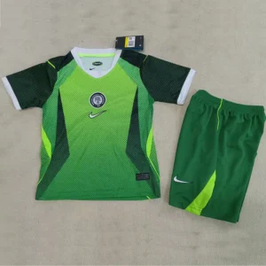 Nigeria 2026/27 Home Kids Kit Fan Version - Front View Bright green soccer jersey with neon lime panels, white collar, team crest and Nike swoosh, paired with matching green shorts.