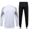 PSG 2025/26 White Half Pull Tracksuit - Back View - KFCool – Football Jerseys & Soccer Kits Store PSG 2025/26 White Half Pull Tracksuit - Back View | KFCOOL
