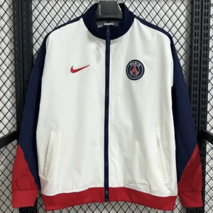 PSG 2025/26 White Windbreaker - Front View White Paris Saint-Germain jacket with navy sleeves and red cuffs, front zipper, and club crest on the chest.