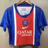 PSG 2026/27 Home Women Crop Jersey Fan Version - Front View PSG football jersey on a hanger with blue sleeves, red torso, and Qatar Airways sponsor logo.