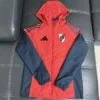 River Plate 2026/27 Red Black Windbreaker - Front View River Plate 2026/27 Red Black Windbreaker - Front View | KFCOOL