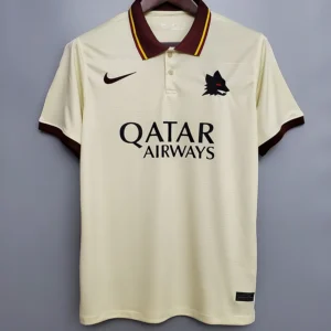 Roma 2020/21 Away Jersey Fan Version - Front View Cream-colored soccer jersey on a hanger with maroon collar and sleeve cuffs; features a black Nike swoosh, Wolves club crest on the chest, and 'QATAR AIRWAYS' sponsor text across the front
