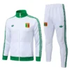 Senegal 2026/27 White Jacket Tracksuit - Front View - KFCool – Football Jerseys & Soccer Kits Store White sports tracksuit set (jacket and pants) with green stripes, Senegal crest, and Adidas logos on chest and pants edges.