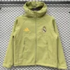 Real Madrid 2026/27 Yellow Green Outdoor Jacket - Front View | KFCOOL